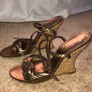 BCBGMaxAzria gold wedges
